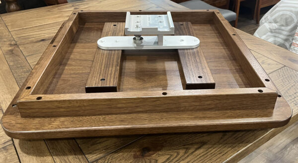 Gunnel Mount Hardware shown on the Walnut table.